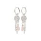 SHIFT hoop earrings silver-plated with pave-crystal discs, dangling pearls, pink teardrop beads, and silver-tone charms, offering whimsical sparkle and dreamy energy.