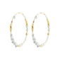 FORCE mega hoop earrings in white/gold-plated, featuring white turquoise, freshwater pearls, and gold accents, perfect for a summer look.