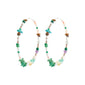 FORCE mega hoop earrings with semi-precious stones and silver-plated details, offering a vibrant, feel-good accessory for casual summer styles.