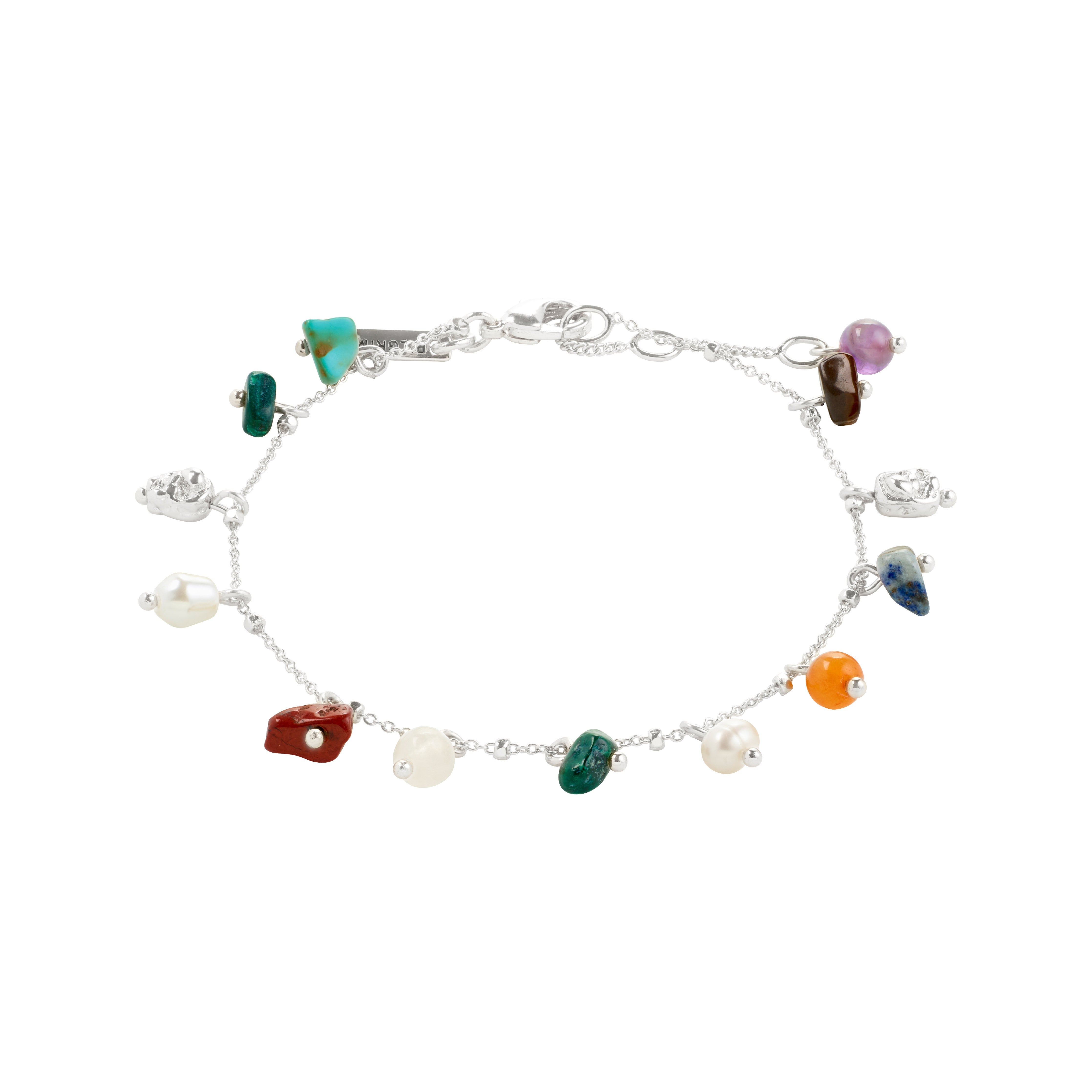 Close-up of the BETWEEN bracelet, silver-plated with vibrant green stone, showcasing luxe boho style from Pilgrim. Ideal for unique, personalized fashion statements.