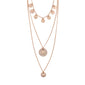 ARDEN 3-in-1 crystal necklace: a rose-gold-tone tiered design with hammered disk charms and crystal accents, offering a unique and feminine ethnic-inspired style.