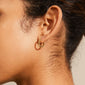 SOLIDARITY small bubbles hoop earrings gold-plated