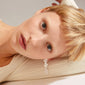 ECHO earrings silver-plated, featuring shiny, flowery links, worn by a woman with short blonde hair, highlighting elegant Scandinavian design.