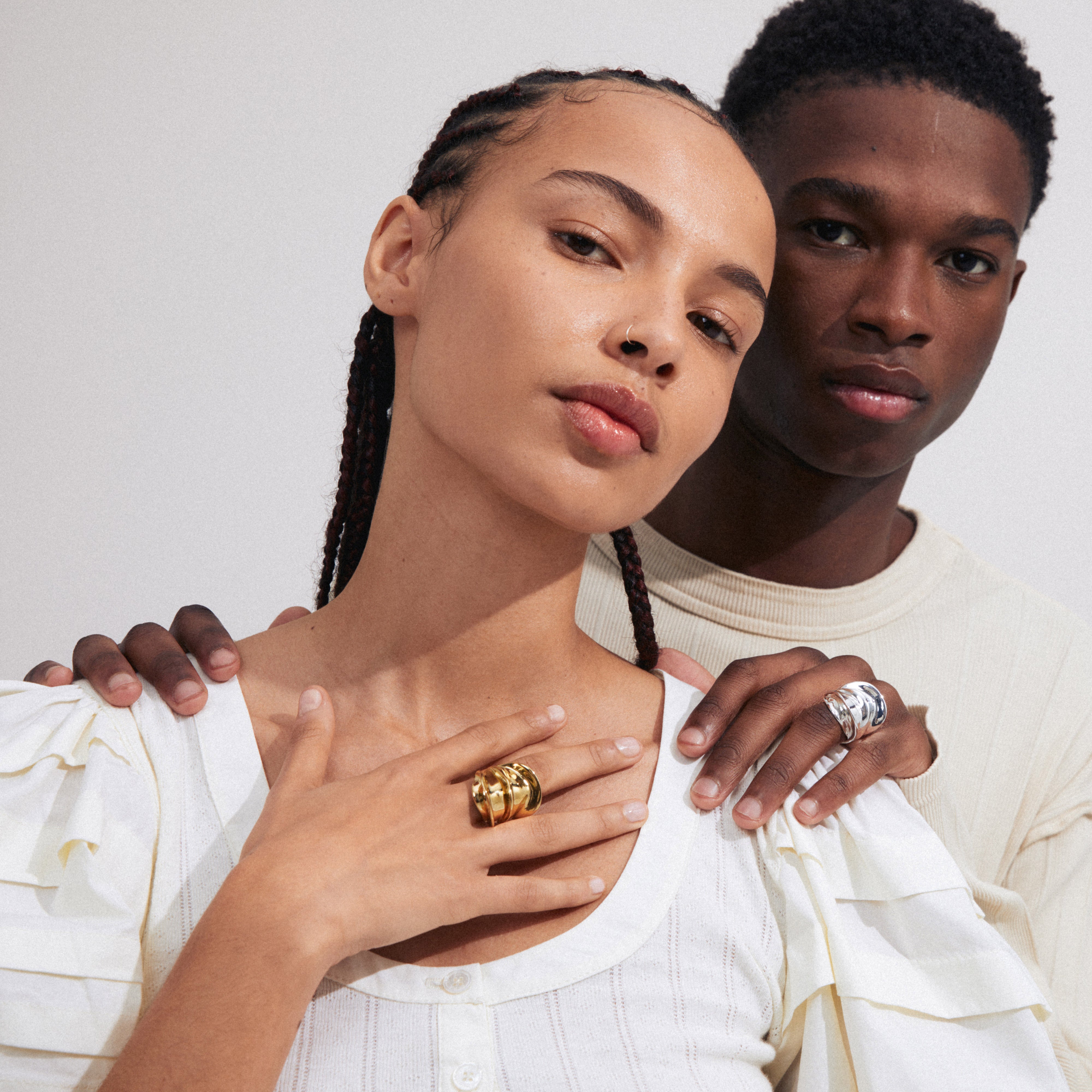 STAY ring gold-plated on a woman's hand, featuring a chunky, iconic design, adjustable fit, from Pilgrim's collection, showcasing Scandinavian craftsmanship and style.