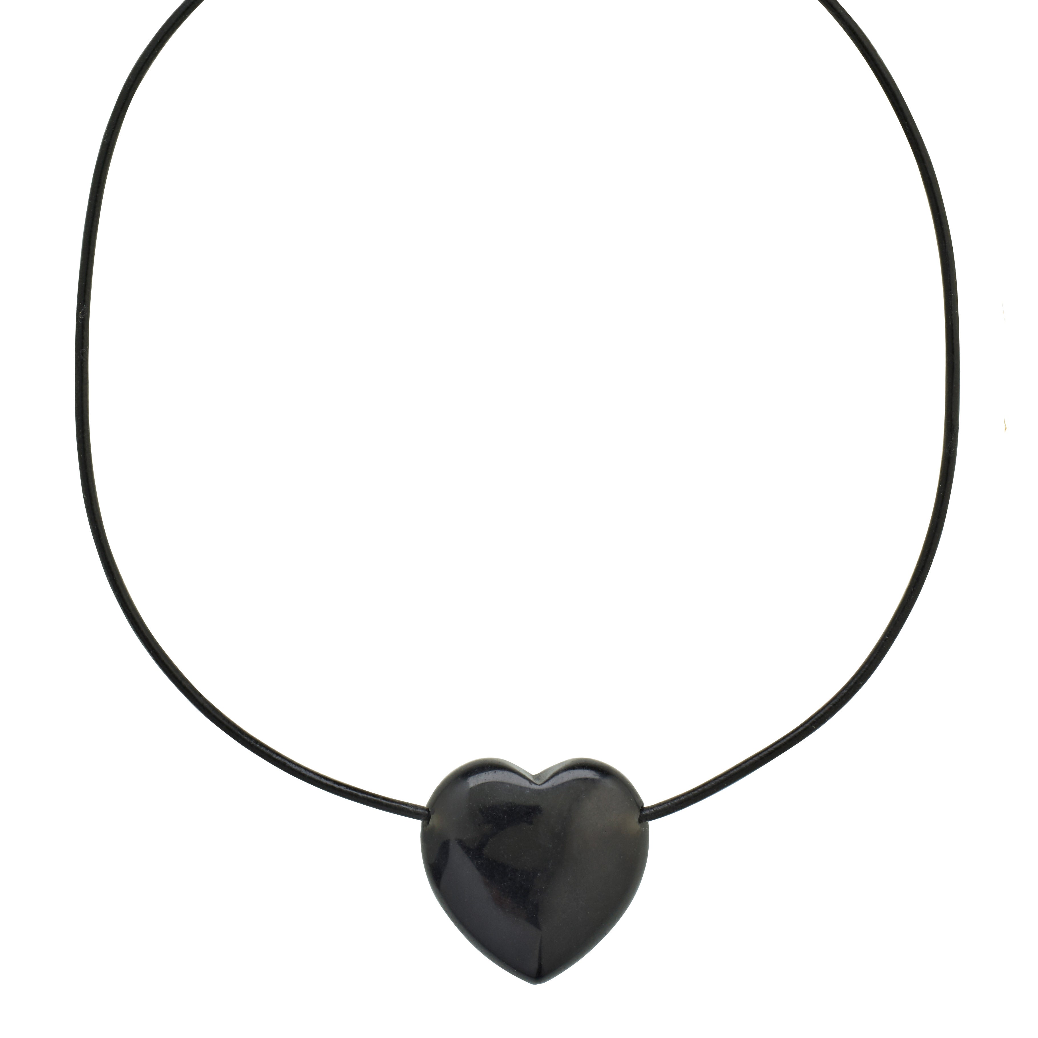 STAY black agate necklace with a large heart pendant on a black leather cord, featuring a gold-plated extension chain for adjustable wear.