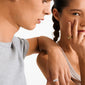 Woman wearing PHASE ring silver-plated by Pilgrim, showcasing its chic, Scandi-style design on her fingers, highlighting its adjustable fit and eco-friendly craftsmanship.
