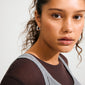 Young woman wearing Pilgrim's PHASE small silver-plated hoops, showcasing their chunky silhouette, perfect for a refined, stylish autumn look.