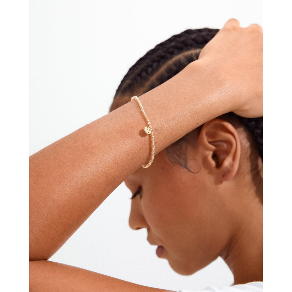 INDIE armband persikofärgat, guldpläterat
