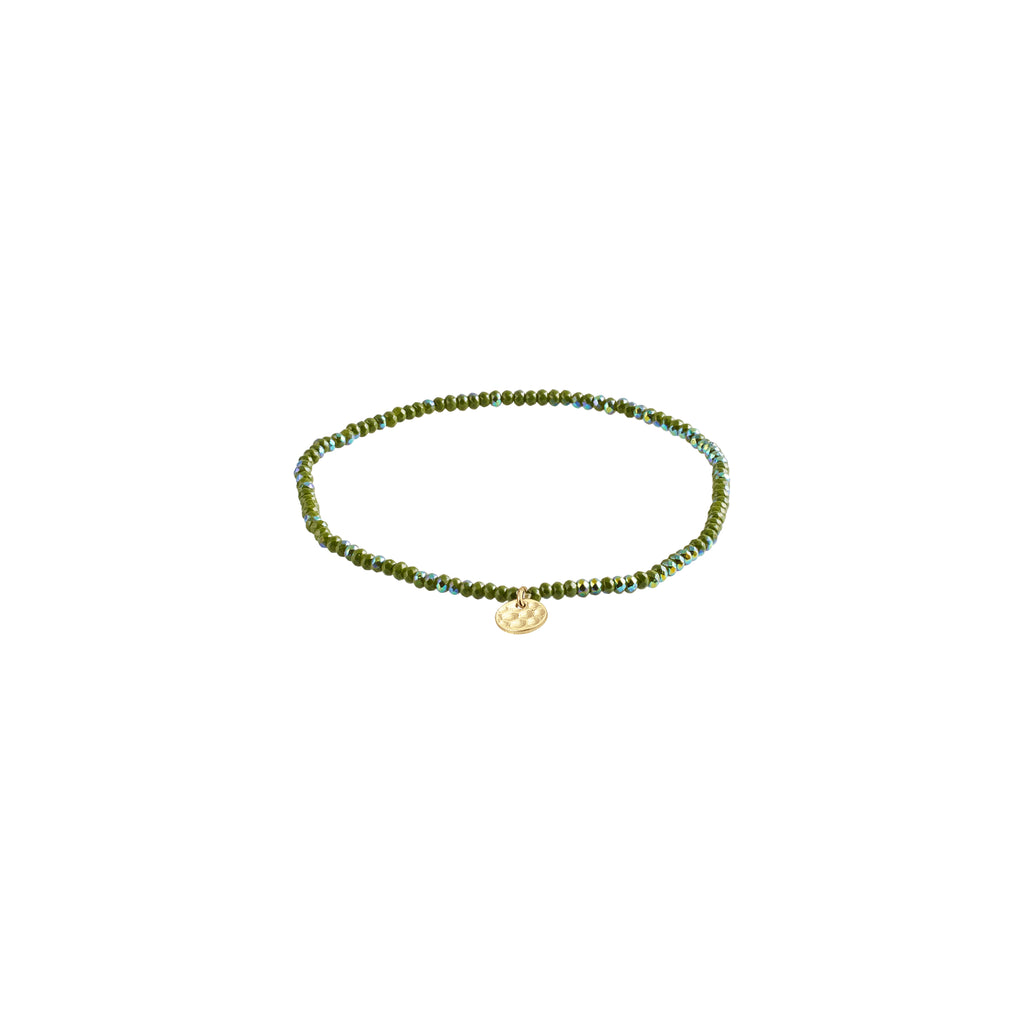 INDIE bracelet featuring faceted green beads and a subtle gold-plated charm, crafted on durable elastic. Perfect for layering and personal style expression.