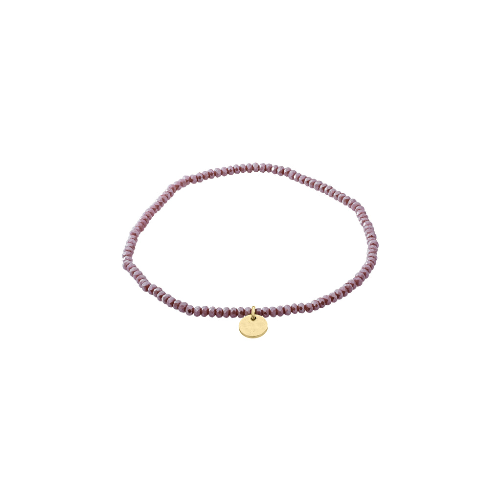 INDIE bracelet purple with gold-plated Pilgrim logo, featuring small faceted glass beads strung on durable Lycra, fits most wrists at 17 cm.