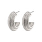 MACIE earrings, silver-plated hoops with intricate patterns, embody bold elegance, perfect for showcasing your strong, feminine style. Ideal for pairing with an elegant suit.