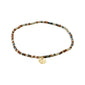 INDIE bracelet grey, gold-plated, featuring small faceted glass beads and a discreet gold-plated Pilgrim logo, strung on durable Lycra elastic for versatile wear.