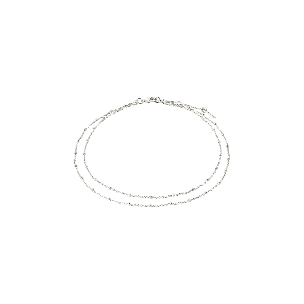 ELKA ankle chain 2-in-1 silver-plated, featuring two delicate chains with small round pendants, offering a chic, layered look.