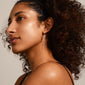 EMILIE chain earrings silver-plated feature sleek chains with a fine pearl detail, reflecting nature-inspired elegance and Pilgrim's Scandinavian craftsmanship. Perfect for autumn's fashion-forward looks.