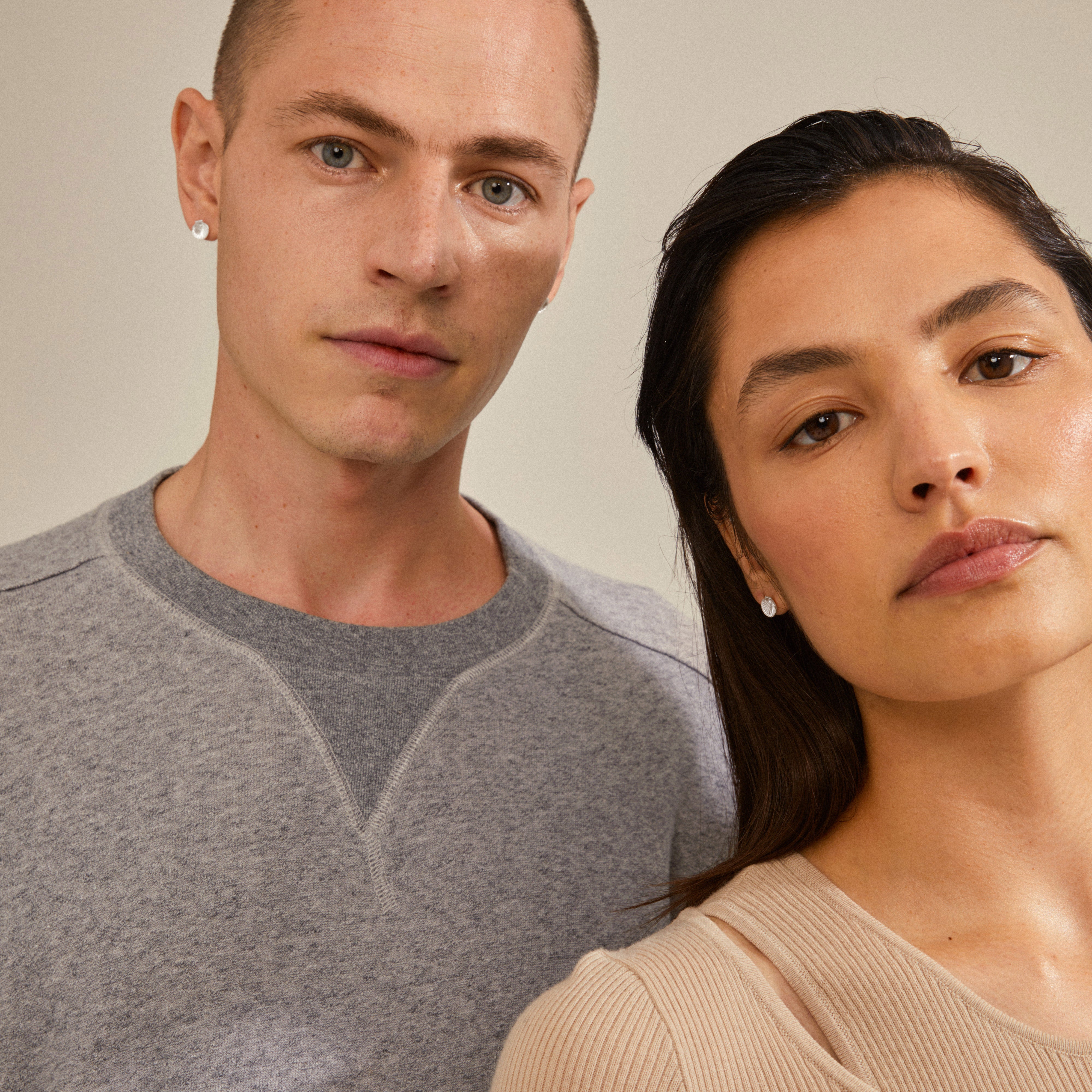 OPAL seashell earrings silver-plated, featuring a seashell and delicate bead, worn by a woman. Perfect for curated ear looks or casual summer outfits.