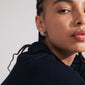 Silver-plated PRISCILLA earrings encapsulate earlobes with shimmering Preciosa crystals, offering a statement look and enhancing everyday style with recycled, Scandinavian-inspired design.