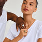 Gold-plated ANNEMETTE ring featuring a chunky, shiny heart design on a woman's hand, showcasing its bold, romantic style from Pilgrim.