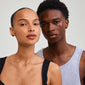 ADEM Tiger Eye earrings featuring rose-carved semi-precious stones, worn by a man and woman, showcasing natural elegance and enhancing personal style.