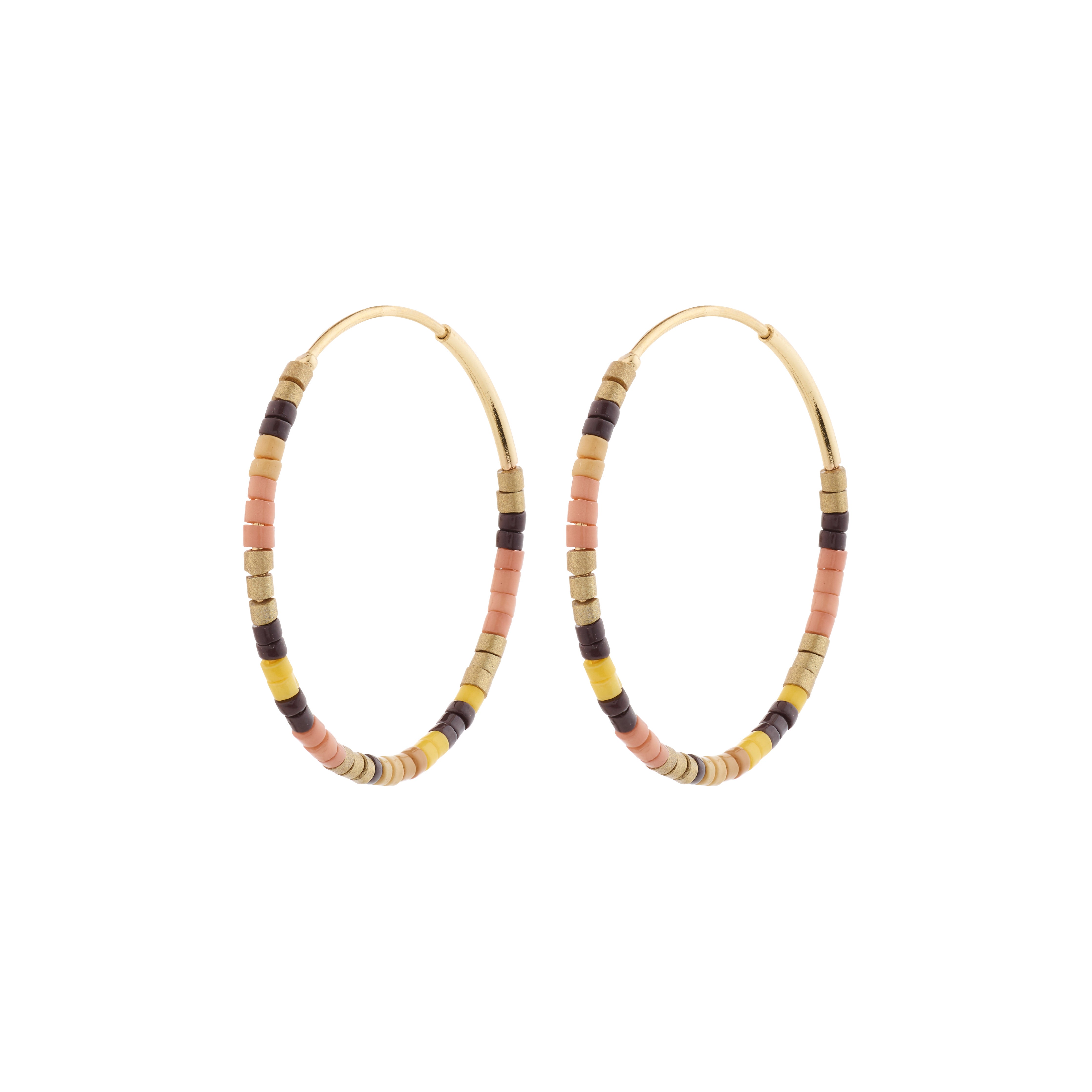 Gold-plated APPOLLONIA hoop earrings with tube-shaped glass beads, offering a relaxed summer style, perfect for layering and capturing the sun's rays.