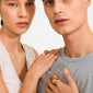 Two models showcase the gold-plated JAMESON ring, featuring a bubble dome design and chunky silhouette, highlighting its minimalist elegance and sustainable craftsmanship.