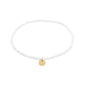INDIE bracelet white, gold-plated: A simple choker-style piece featuring faceted white beads and a small gold-tone disc charm on elastic for versatile wear.