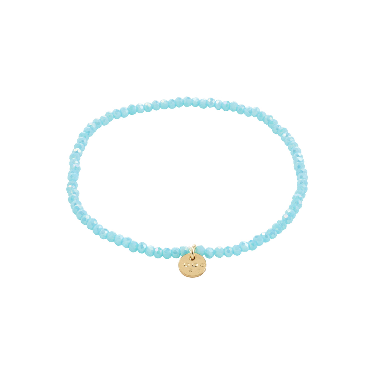 INDIE bracelet skyblue features faceted blue beads and a gold-plated disc, elegantly designed for stacking. Elastic fit, perfect for versatile styling.