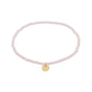 INDIE bracelet rose, gold-plated: A delicate stretch bracelet with pale rose faceted beads and a small gold-toned charm, perfect for stacking or solo wear.