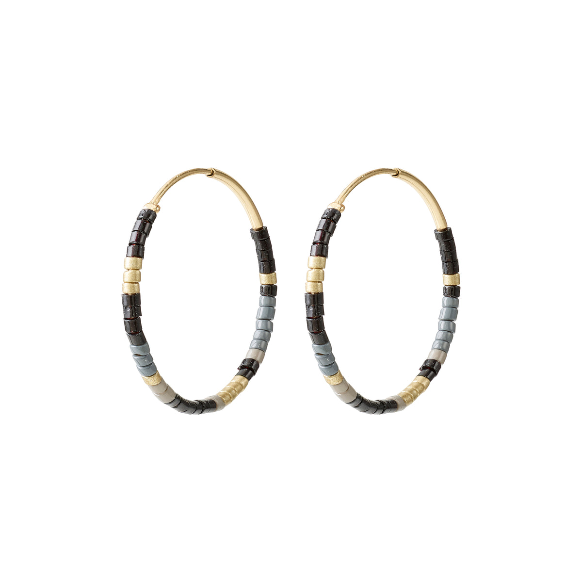 ALISON earrings feature wire-based hoops with matte gold, black, gray, and charcoal beads, offering a chic boho-minimalist style from Pilgrim's handmade Danish collection.