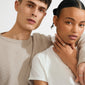 Young woman wears the LARKIN ring silver-plated, showcasing its wavy design. The ring complements her minimalist style, embodying Pilgrim's timeless and trendy Scandinavian craftsmanship.