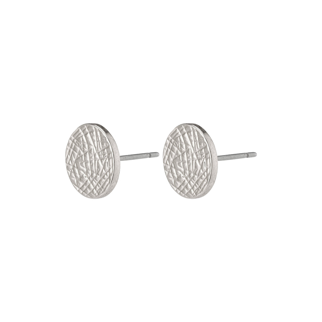 WYNONNA rustic earrings, silver-plated with a raw pattern, offering a blend of edgy elegance for versatile styling.