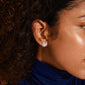 WYNONNA rustic earrings, silver-plated, with a raw, textured design, worn by a woman with curly hair, showcasing an edgy yet elegant style.