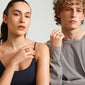 KIERAN ring silver-plated on a woman's finger, exemplifying style and confidence. This chunky, adjustable piece is crafted from 99% recycled material.