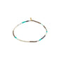 ALISON bracelet features mint green and grey glass beads with a gold-plated clasp, perfect for stacking, reflecting Pilgrim's boho-inspired Danish jewellery design.