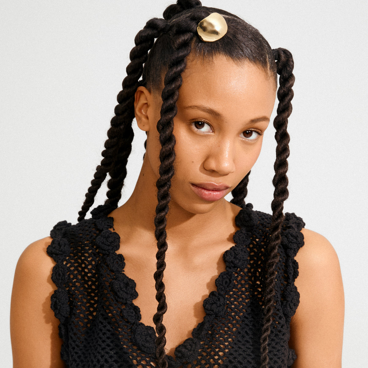 AMARIS hair accessory gold-plated adorns long braids, enhancing the stylish look with its shiny deco element, perfect for an elevated casual or formal hairstyle.