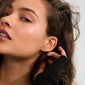 Silver-plated RIO single earring with LOVE inscription, crafted from 99% recycled materials, conveying warmth and positivity, perfect for a stylish, meaningful accessory choice.