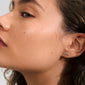 Silver-plated RIO single earring, featuring the word LOVE, crafted from 99% recycled material, conveying warmth and positivity. Ideal for solo or stacked wear.