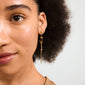 SUTTON single gold-plated earring featuring Aventurine and Tiger Eye stones, showcasing boho elegance with organic shapes for a unique, chic look.