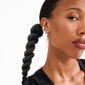FINLEY single earring silver-plated with dangling chains and beads, worn by woman with braided hair and multiple silver hoop cuffs.