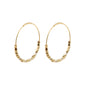 ROMINA pearl deco hoop earrings gold-plated feature minimalist hoops with faceted gold-tone and white beads, embodying Pilgrim's blend of timeless Danish style and modern flair.