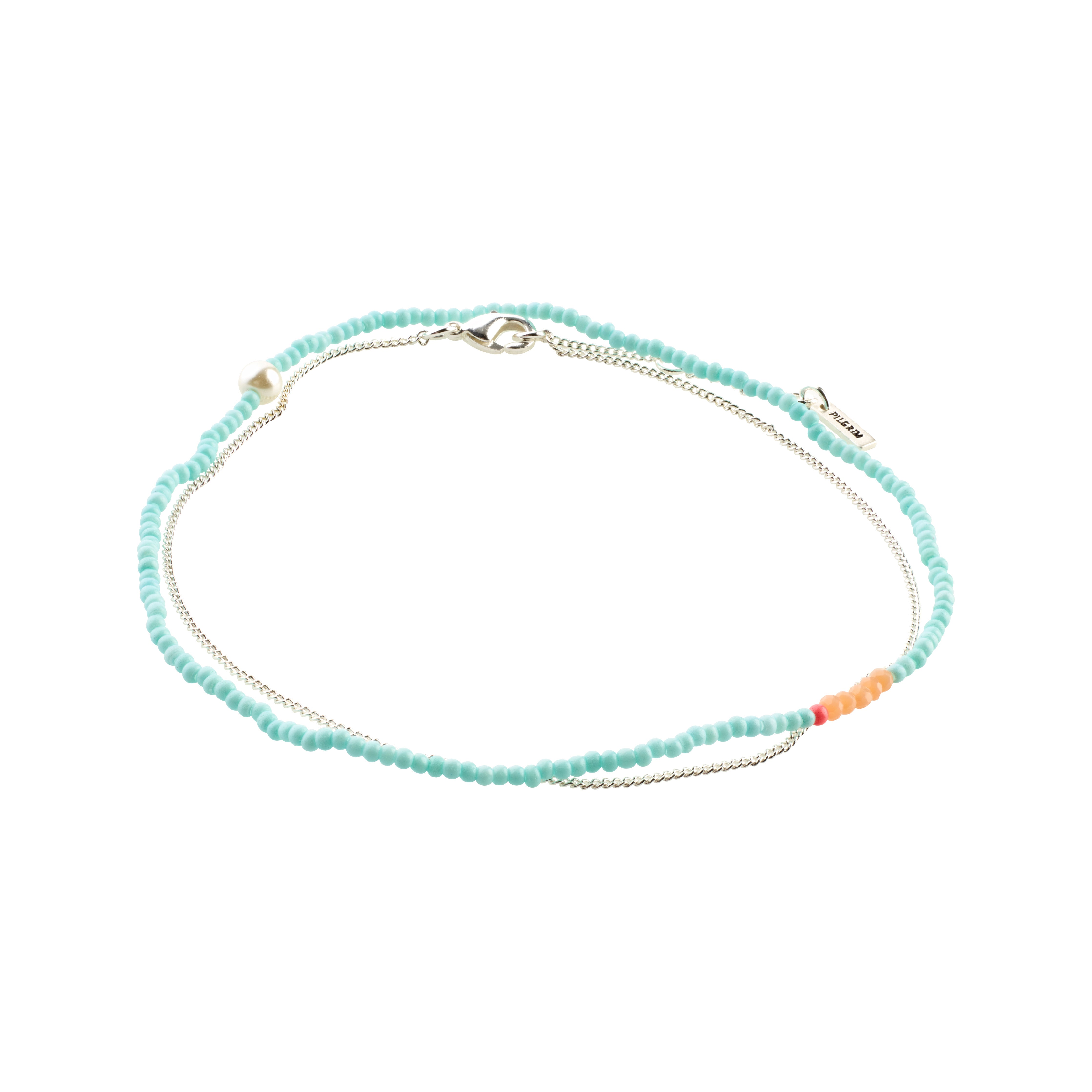 Close-up of the PALOMA ankle chains 2-in-1 set featuring turquoise beads and a silver-plated chain, embodying Pilgrim's blend of trendy and timeless design.