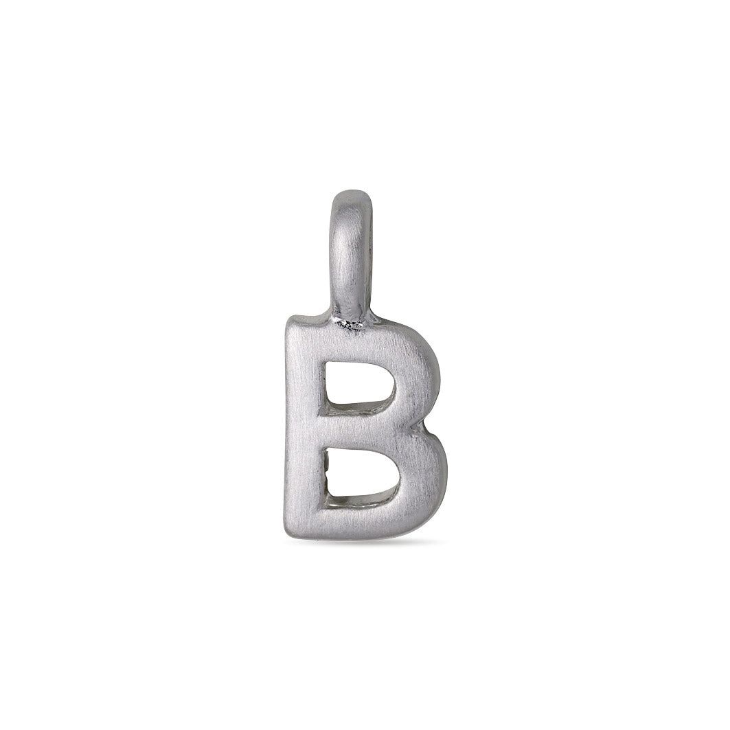 CHARM B pendant, silver-plated, features a brushed metallic finish with a loop for easy attachment, ideal for creating personalized, stylish jewellery combinations.