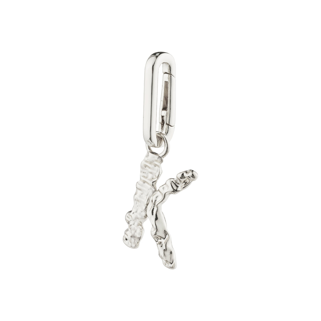 Silver-plated CHARM pendant K from Pilgrim, crafted from recycled materials, perfect for creating a personalized, stylish look on chains or cords.