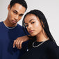 Man and woman showcasing the CHARM curb necklace silver-plated, a stylish, adjustable curb chain perfect for adding charms and creating an edgy, urban look.