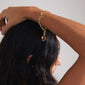 Gold-plated CHARM bracelet with delicate cable chain design, perfect for adding charms. Ideal for stacking, adjustable length, and crafted from 97% recycled material.