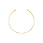 CHARM choker gold-plated necklace: minimalist design with open-ended gold wire and small gold beads, ideal for adding charms. Crafted from 99% recycled materials.