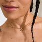 Gold-plated mini flower pendant charm, perfect for bracelets, necklaces, or hoops. Made from 99% recycled material, water-resistant, offering a sweet, nature-inspired style.