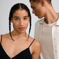 Gold-plated CHARM mini crystal pendant, ideal for enhancing hoops or necklaces with a minimalist, sparkling touch. Made with 85% recycled, water-resistant materials.