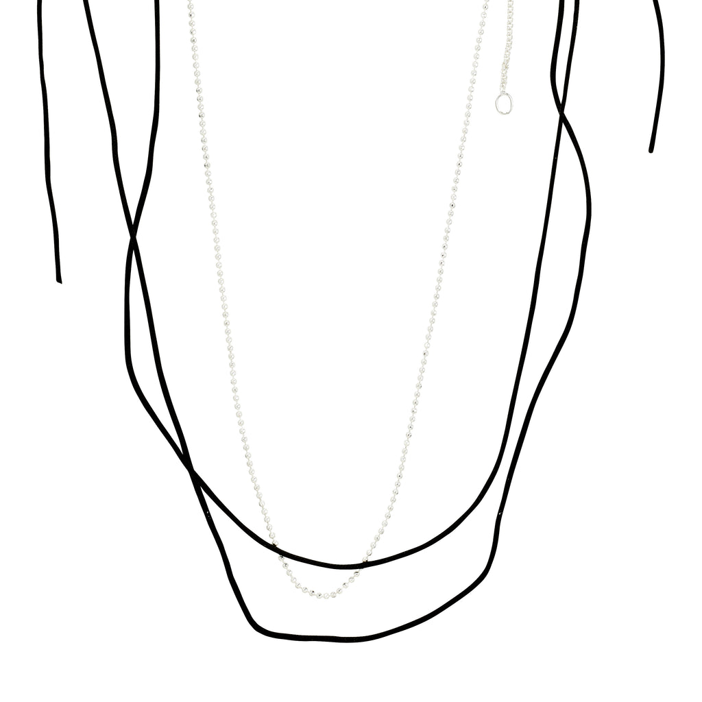 Pilgrim's CHARM necklace 2-in-1 set features a silver-plated bead chain and a versatile black cotton cord for personalized styling with charms.