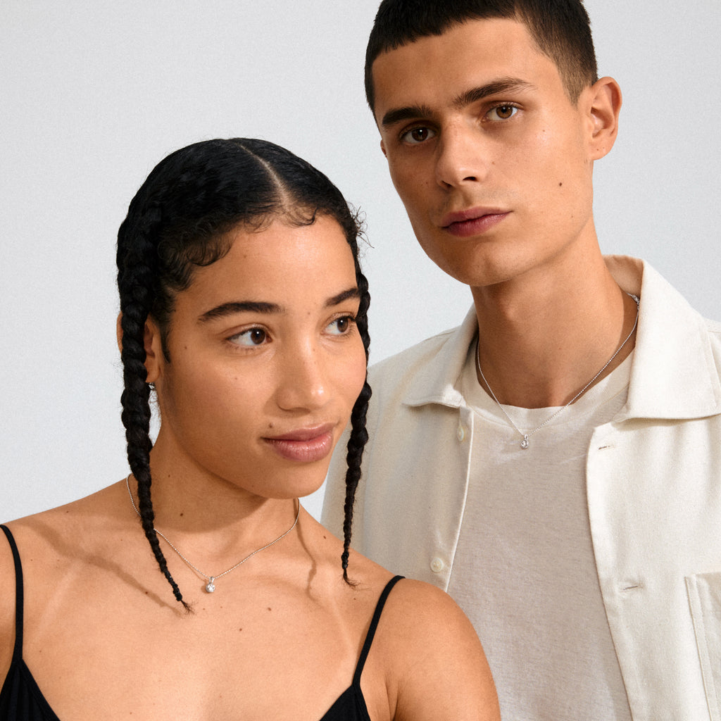Silver-plated CHARM mini crystal pendant, perfect for adding sparkle to hoops or necklaces. Made from 85% recycled materials for an eco-friendly, stylish look.