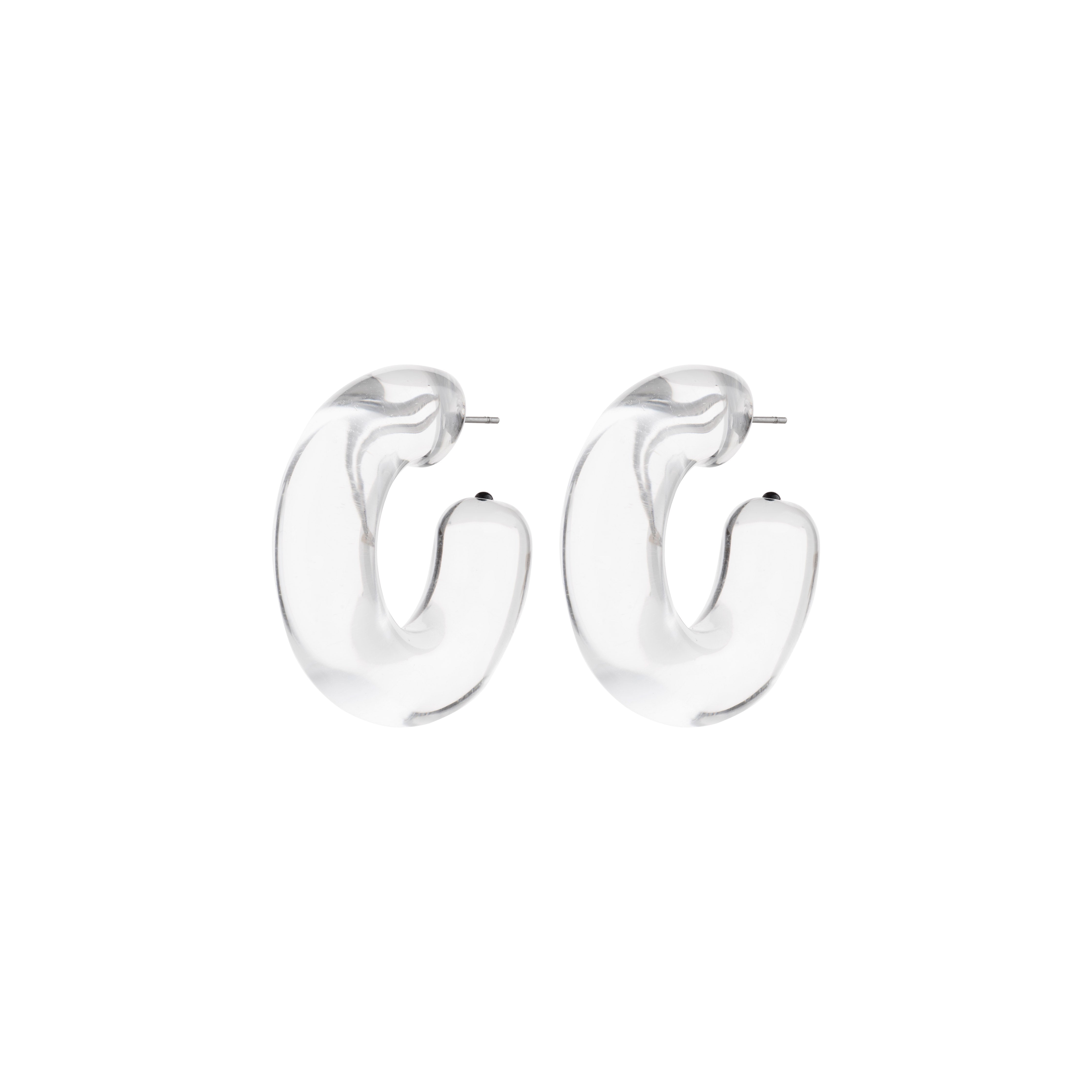 FREJA WEWER x PILGRIM Aqua hoops medium, crystal: Chunky C-shaped transparent acrylic earrings, offering a trendy, versatile look with a recycled material focus. Ideal for stylish, eco-conscious wearers.